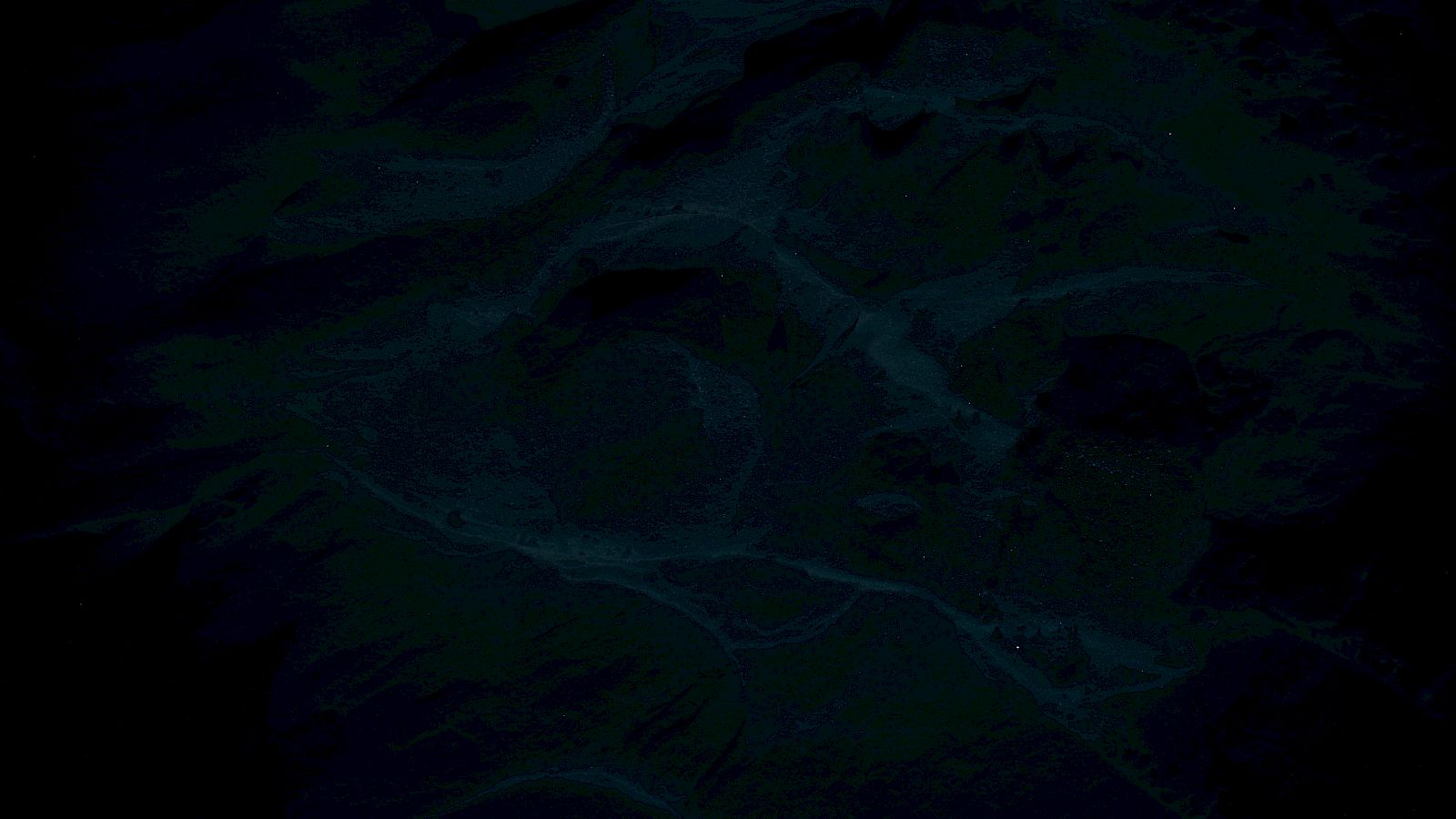 The image is too dark to make out any details clearly.